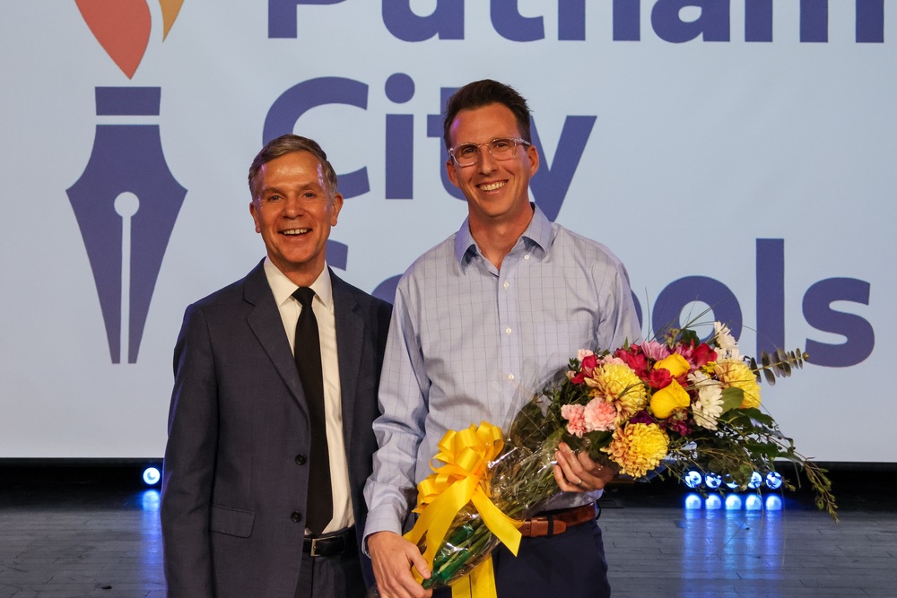 Teacher of the Year Patrick Runnells with Dr. Fred Rhodes