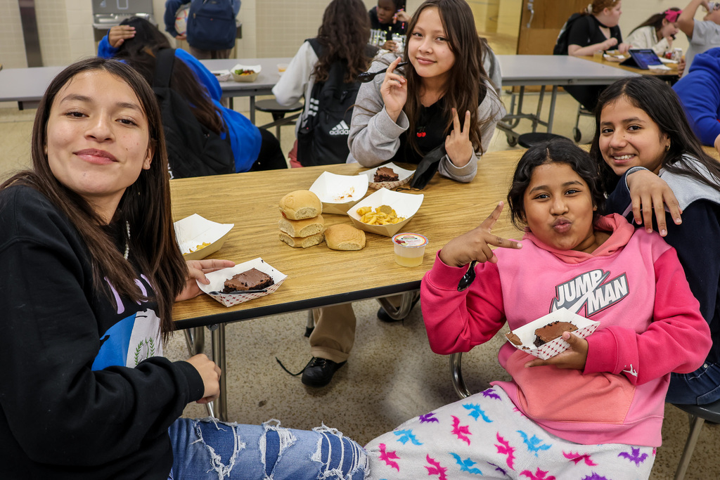 middle school students eating beetnik cake